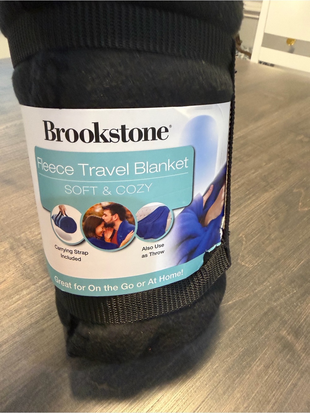 Brookstone Black Fleece Travel Blanket with Carry Strap